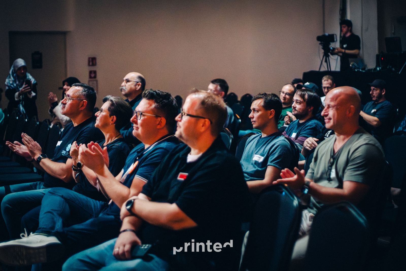 The audience laughing together during a talk