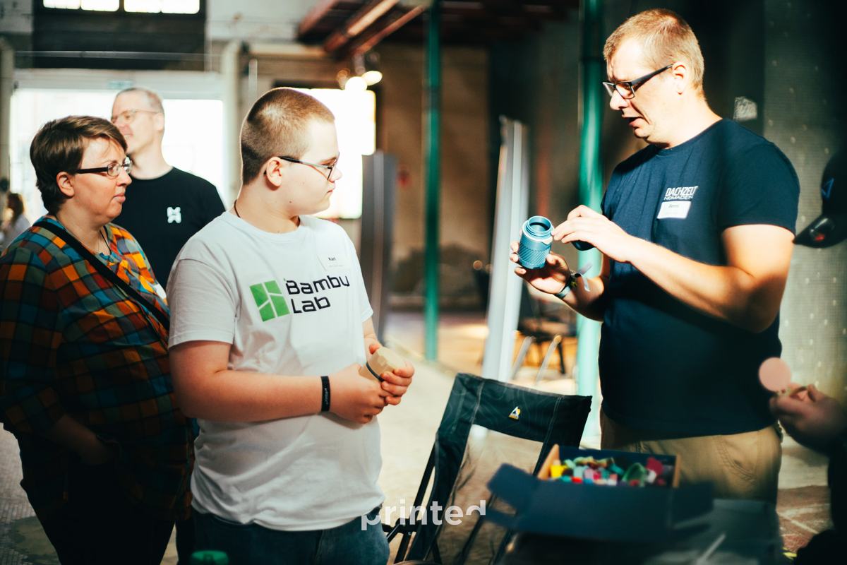 Community members showing their printed projects